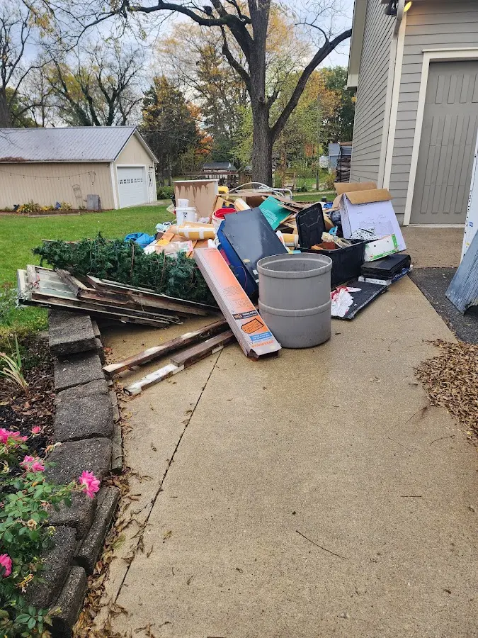 Dumpster being loaded with debris for Demolition Dumpster Rental in Sadsbury
